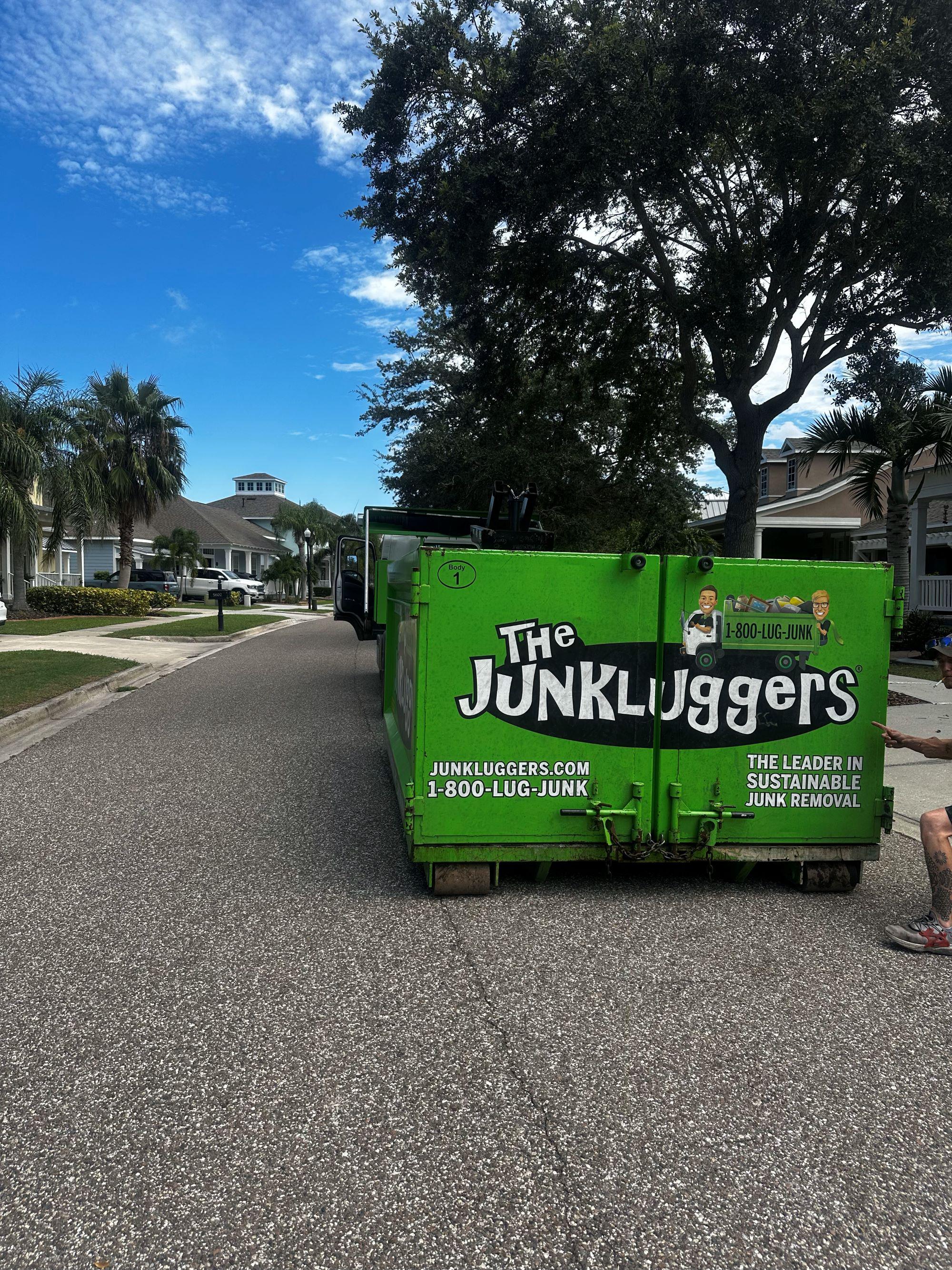 Junkluggers ready for eco-friendly junk removal in a neighborhood