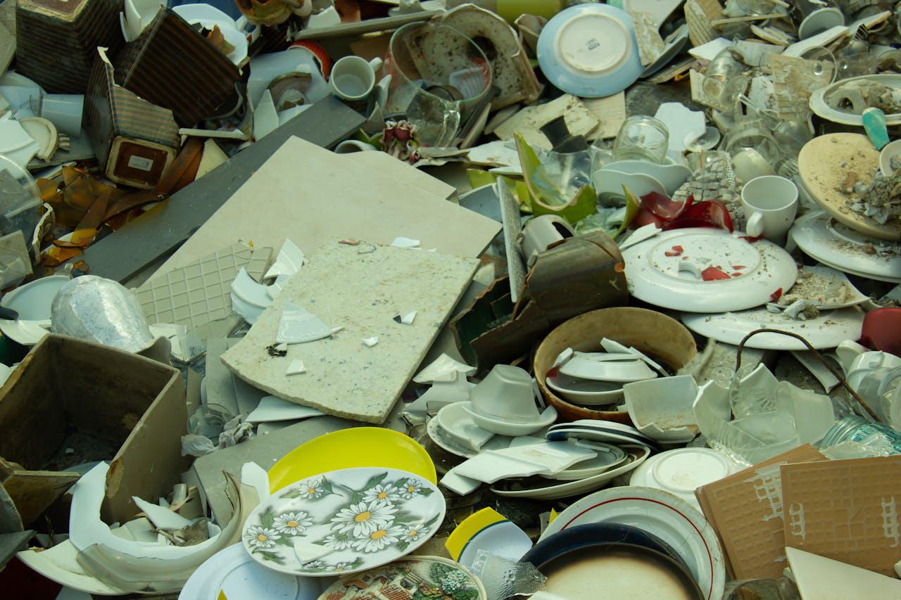 Stack of broken ceramics and glass