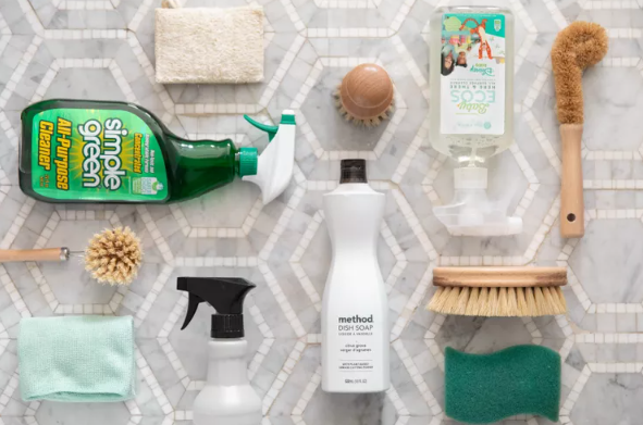 cleaning products organized on tile floor