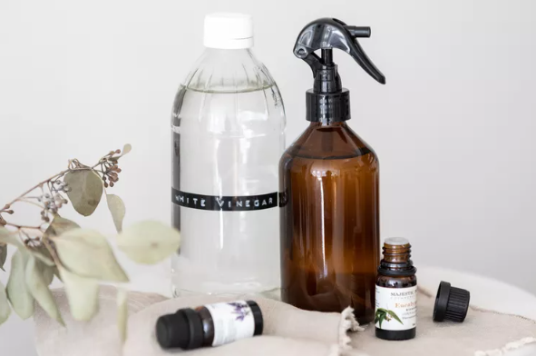 white vinegar bottle and spray bottle