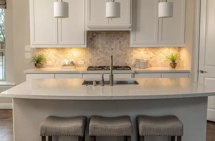 clean, up to date kitchen with island in the middle
